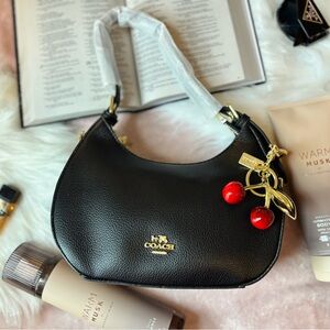 Coach Black Leather Shoulder Bag with Red Charm